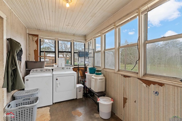 washroom featuring wooden ceiling and independent washer and dryer