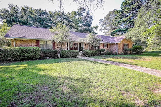 ranch-style house with a front lawn