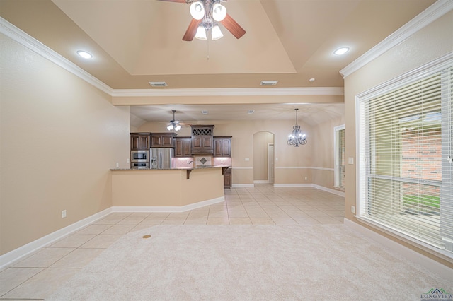 2532 Windmill Ln, Longview, TX 75601 - unfurnished living room featuring ceiling fan, light tile patterned floors, crown molding, arched walkways, and recessed lighting