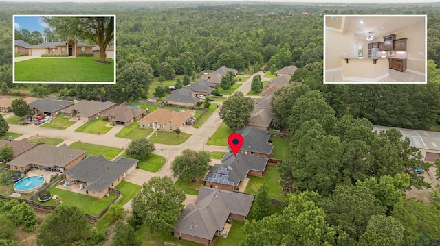 2532 Windmill Ln, Longview, TX 75601 - aerial perspective of suburban area featuring a heavily wooded area