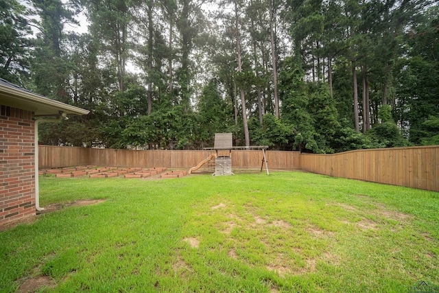 2532 Windmill Ln, Longview, TX 75601 - fenced backyard featuring a playground