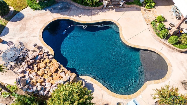 outdoor pool with a patio