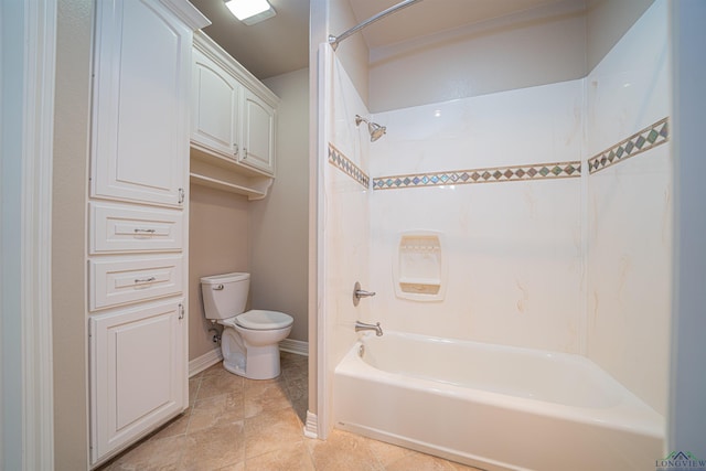 full bathroom featuring toilet, baseboards, and tub / shower combination