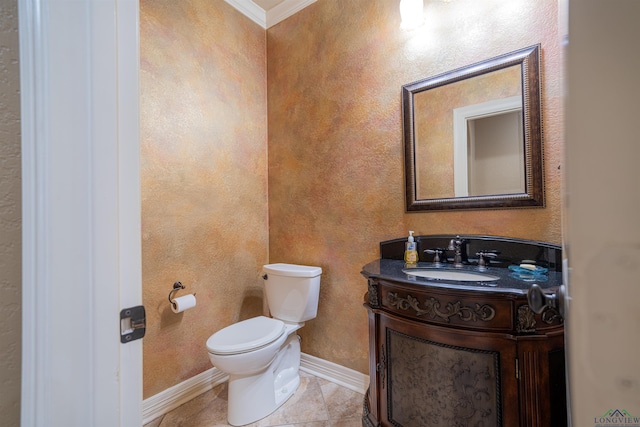 half bath featuring crown molding, toilet, vanity, tile patterned flooring, and baseboards