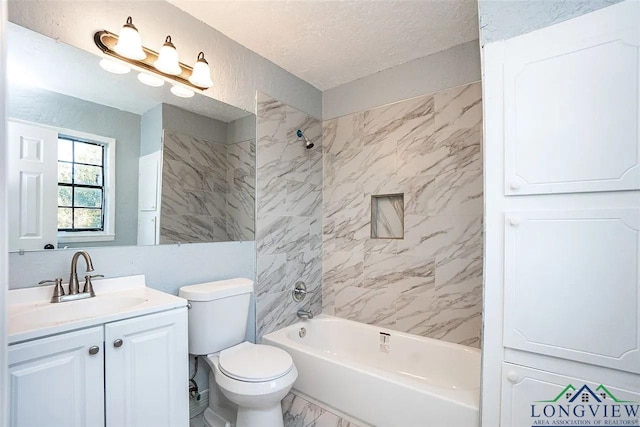 full bath with vanity, toilet, a textured ceiling, marble finish floor, and shower / bathtub combination