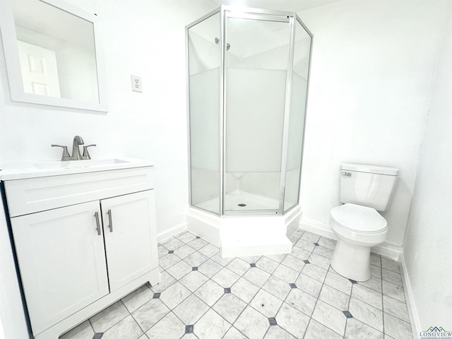 1435 Tom Smith Rd, Harleton, TX 75651 - bathroom with baseboards, vanity, toilet, a shower stall, and tile patterned flooring