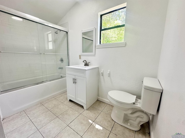 1435 Tom Smith Rd, Harleton, TX 75651 - full bath featuring toilet, vanity, tile patterned floors, and bath / shower combo with glass door