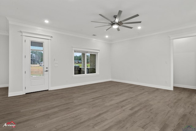 unfurnished living room featuring crown molding, dark wood-type flooring, and ceiling fan