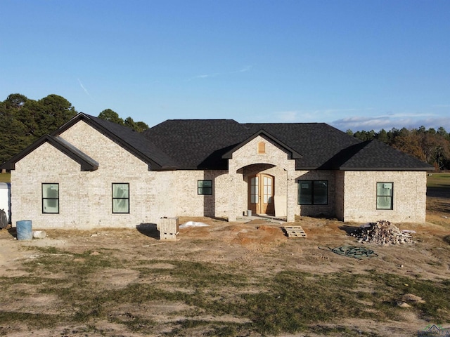 french country style house featuring french doors