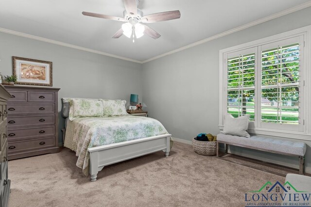 1805 Greenway St, Gilmer, TX 75644 - bedroom with ornamental molding, light colored carpet, ceiling fan, and baseboards