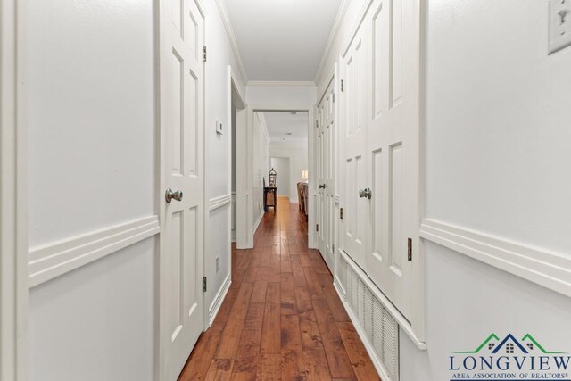 1805 Greenway St, Gilmer, TX 75644 - corridor with wood-type flooring and ornamental molding