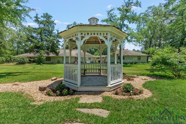 1805 Greenway St, Gilmer, TX 75644 - surrounding community with a gazebo and a lawn