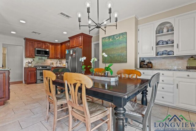 1805 Greenway St, Gilmer, TX 75644 - dining area featuring a chandelier, recessed lighting, ornamental molding, and light tile patterned floors
