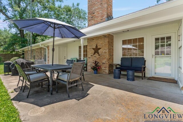 1805 Greenway St, Gilmer, TX 75644 - view of patio featuring outdoor dining area