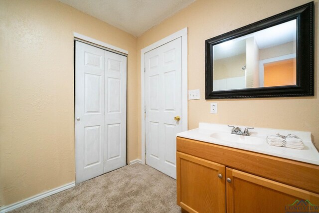 809 Herbert St, Marshall, TX 75670 - bathroom featuring vanity and baseboards