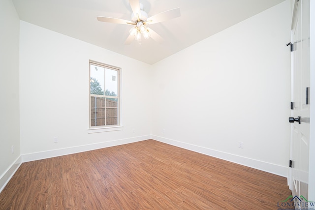 unfurnished room featuring ceiling fan and wood-type flooring