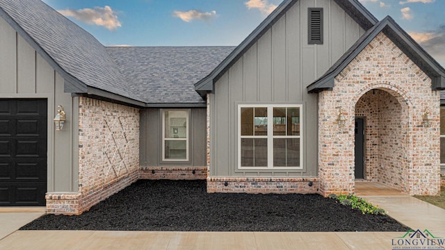 property entrance featuring a garage