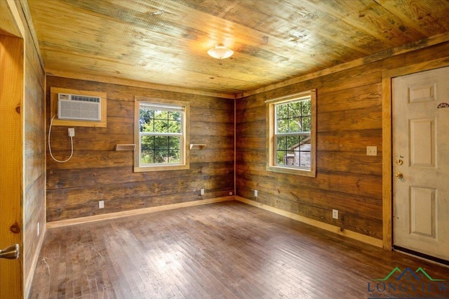 1150 Fm 139, Joaquin, TX 75954 - unfurnished room featuring wood ceiling, healthy amount of natural light, an AC wall unit, wood-type flooring, and wood walls