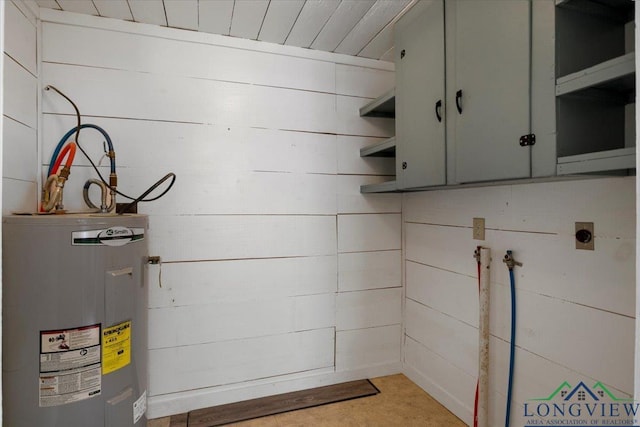 1150 Fm 139, Joaquin, TX 75954 - utility room featuring electric water heater