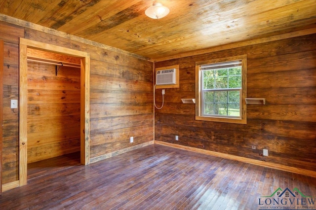 1150 Fm 139, Joaquin, TX 75954 - unfurnished room with wooden ceiling, dark wood-type flooring, and wood walls