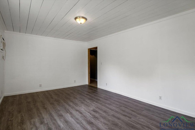 1150 Fm 139, Joaquin, TX 75954 - empty room featuring dark wood-type flooring, wood ceiling, and ornamental molding