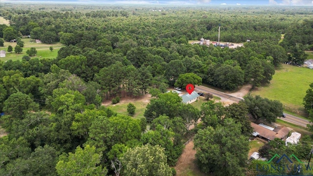 1150 Fm 139, Joaquin, TX 75954 - aerial view of property and surrounding area featuring a forest