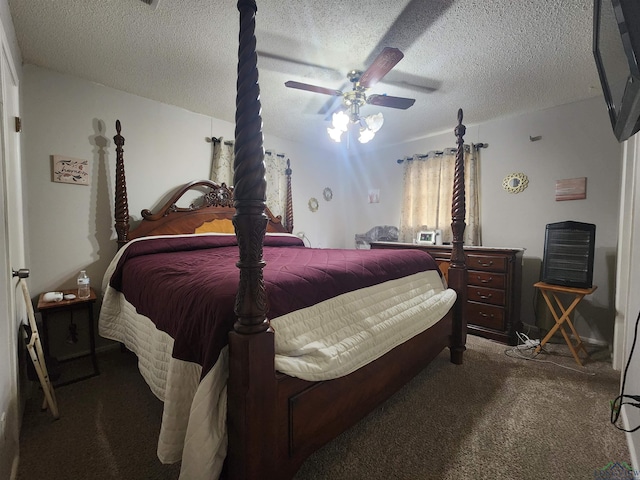 bedroom with ceiling fan, carpet, and a textured ceiling