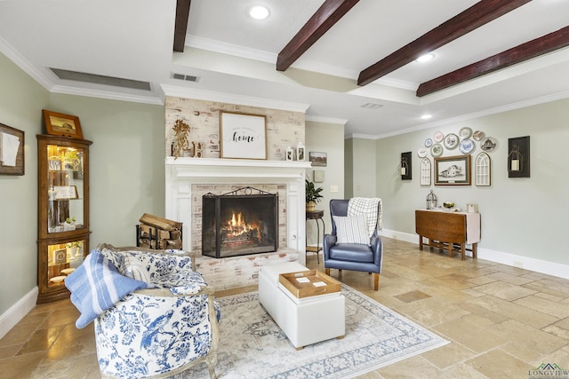 living area with visible vents, a brick fireplace, baseboards, beamed ceiling, and stone tile flooring