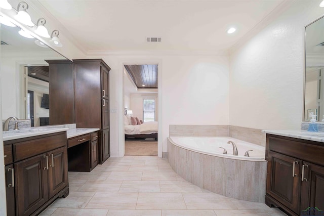 full bath featuring visible vents, a bath, connected bathroom, crown molding, and two vanities