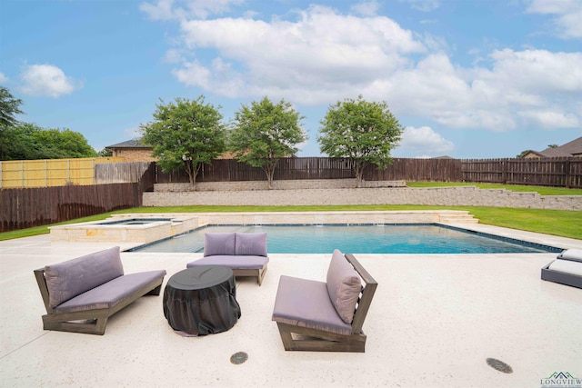 view of pool with a patio area, an in ground hot tub, a fenced in pool, and a fenced backyard