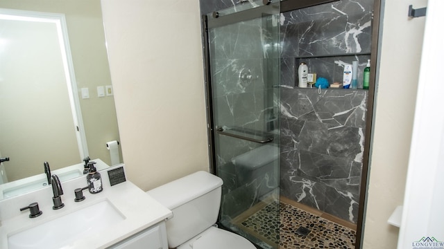 107 Kelly Ct, Marshall, TX 75672 - full bath with a marble finish shower, vanity, and toilet
