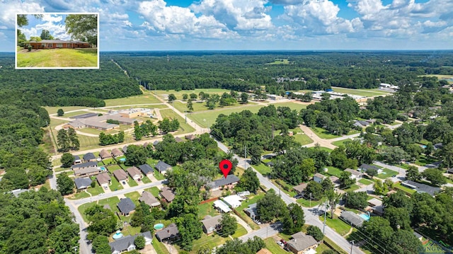 2215 Redbud, Kilgore, TX 75662 - bird's eye view of a heavily wooded area
