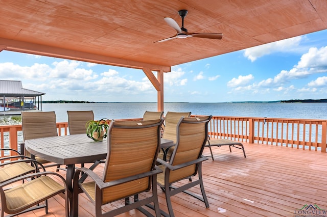 22551 Pine St, Frankston, TX 75763 - wooden terrace featuring outdoor dining space, a water view, and ceiling fan