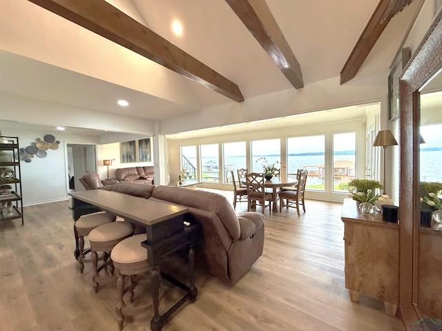 22551 Pine St, Frankston, TX 75763 - living room with beam ceiling, healthy amount of natural light, light wood-style floors, recessed lighting, and a water view