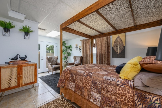 22551 Pine St, Frankston, TX 75763 - bedroom with french doors, light tile patterned floors, and access to outside