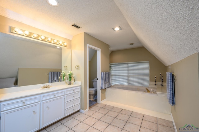 22551 Pine St, Frankston, TX 75763 - full bath featuring vanity, a bath, lofted ceiling, tile patterned floors, and a textured ceiling