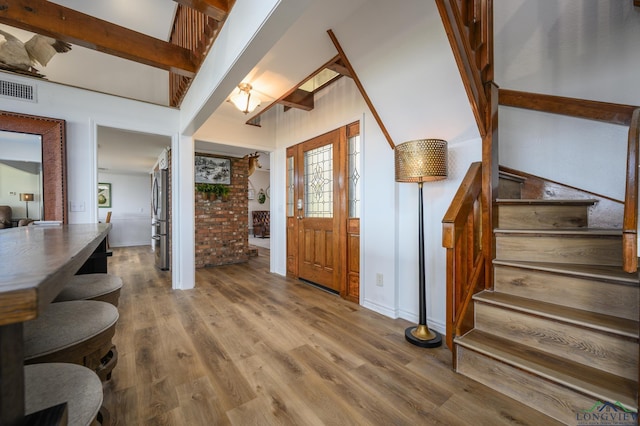22551 Pine St, Frankston, TX 75763 - entryway featuring stairway and wood finished floors