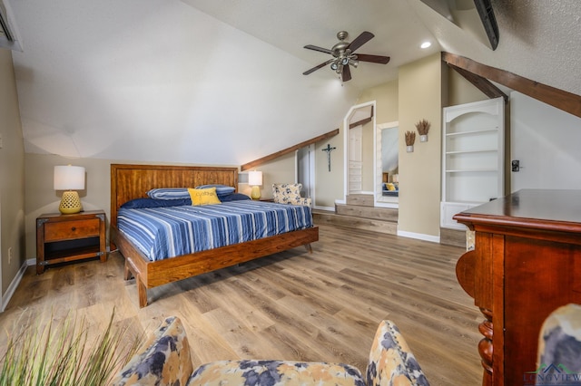 22551 Pine St, Frankston, TX 75763 - bedroom with lofted ceiling, wood finished floors, and recessed lighting