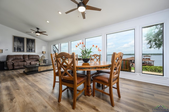 22551 Pine St, Frankston, TX 75763 - dining area featuring ceiling fan, vaulted ceiling, wood finished floors, recessed lighting, and a water view