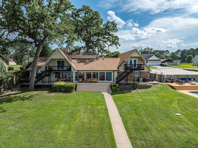 22551 Pine St, Frankston, TX 75763 - back of property featuring stairway and a wooden deck