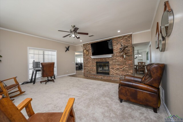22551 Pine St, Frankston, TX 75763 - carpeted living area with a ceiling fan, a fireplace, ornamental molding, and recessed lighting