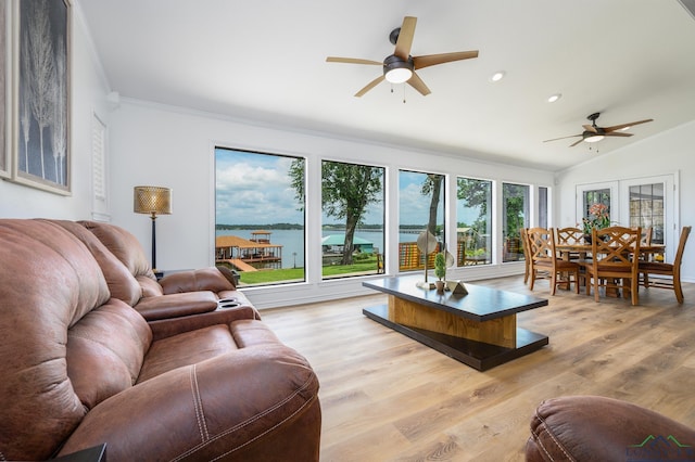 22551 Pine St, Frankston, TX 75763 - living area with a ceiling fan, recessed lighting, lofted ceiling, a water view, and light wood-type flooring