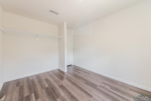 801 W Walnut St, Longview, TX 75601 - spacious closet with wood finished floors