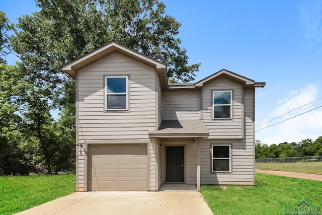 801 W Walnut St, Longview, TX 75601 - traditional home featuring a garage, concrete driveway, and a shingled roof