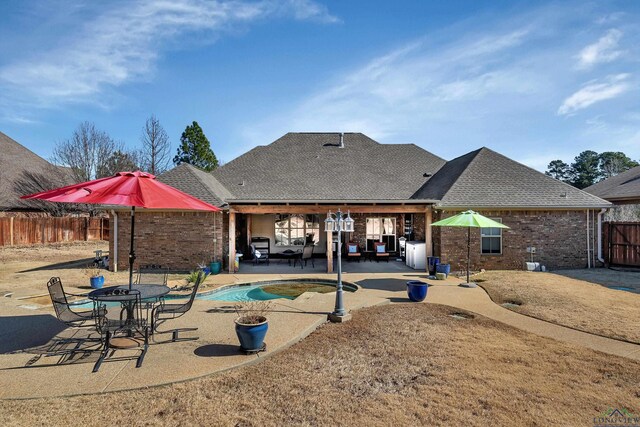 view of patio with grilling area and ceiling fan