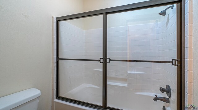 doorway with dark tile patterned floors