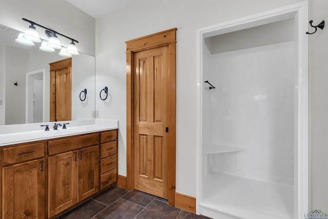 bathroom featuring vanity and walk in shower