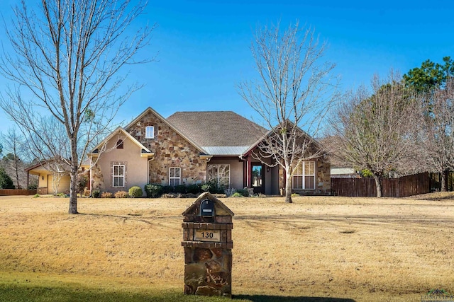 view of front facade with a front yard