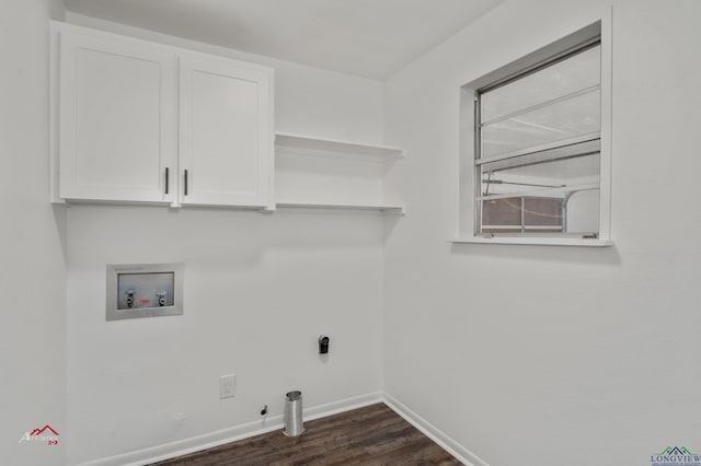 laundry room featuring cabinets, dark hardwood / wood-style floors, gas dryer hookup, and hookup for a washing machine