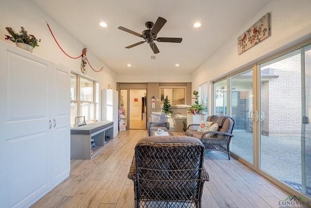 interior space with ceiling fan and light hardwood / wood-style flooring